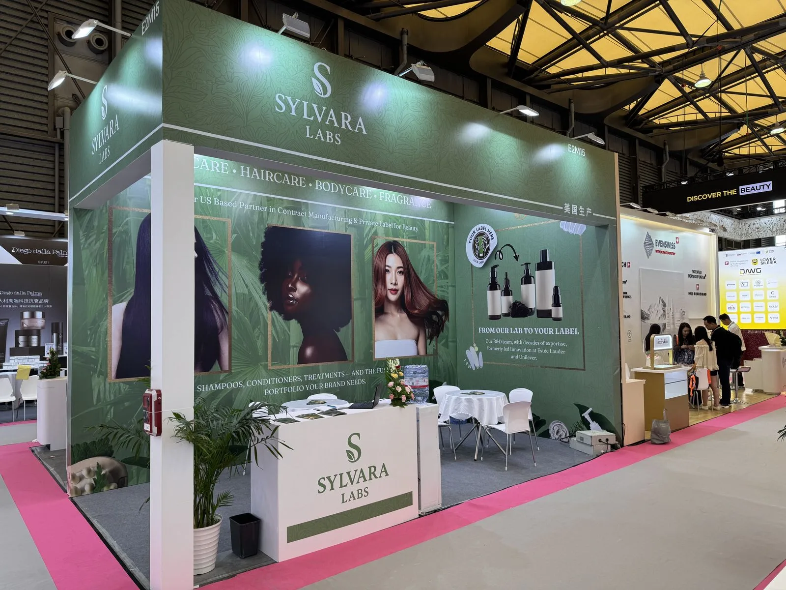 Sylvara Labs booth as built — full corner shell on the CBE floor